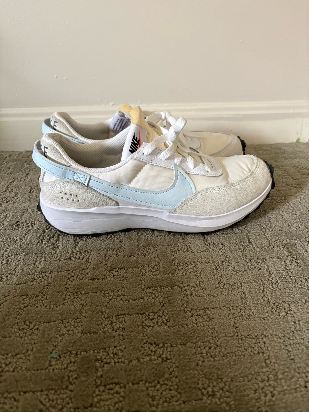 Nike White Sneakers with Pale Blue Swoosh